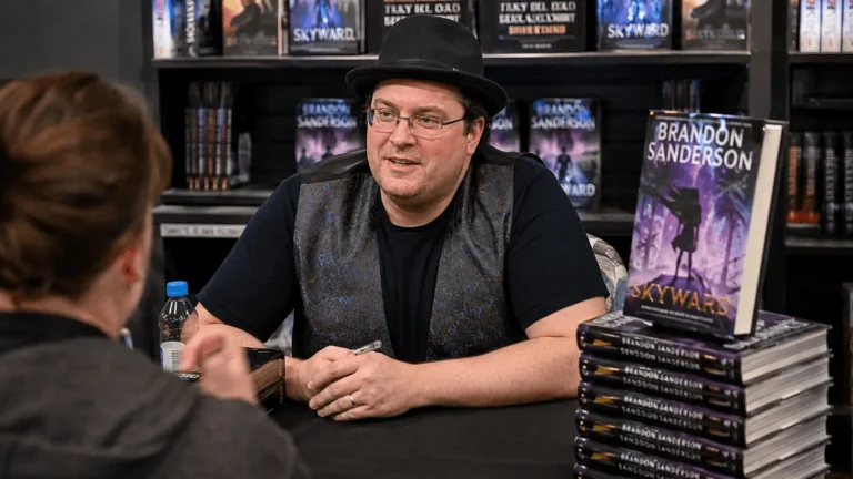 Brandon Sanderson net worth author at a book signing event